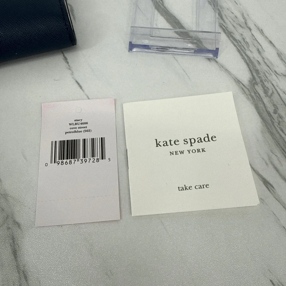 NWT Kate Spade Stacy Large Slim Bi-Fold Wallet Pebble Blue Quiet Luxury Chic
